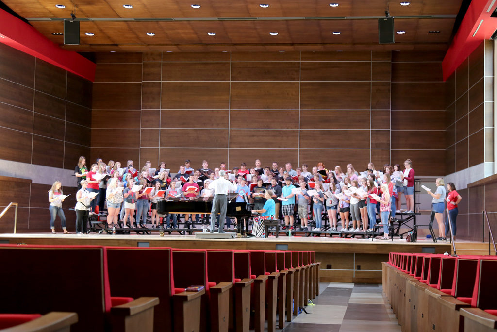 A cappella choir rehearsing in Douwstra Auditorium